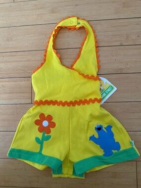 Sesame Street Yellow Romper with Orange Trim and Cookie Monster Appliqué